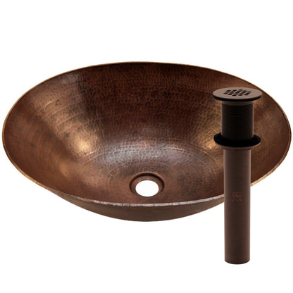 Oval hammered copper vessel bath sink in antique finish by Novatto, traditional bathroom sink with a rustic, hammered design.
