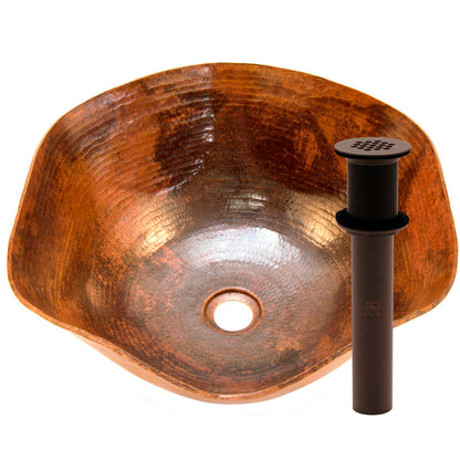 Traditional hammered copper vessel sink with scalloped edges in natural finish, designed for bathroom use by Novatto.