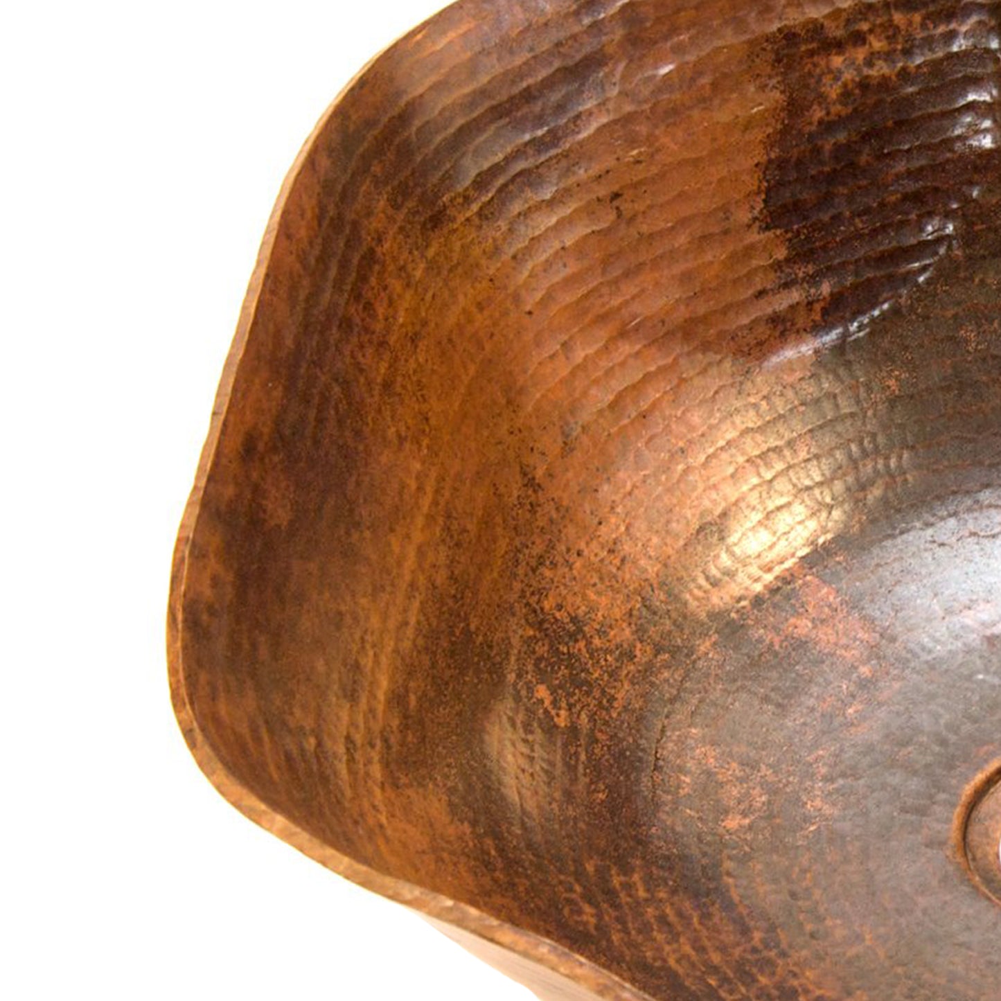 Traditional hammered copper vessel sink with scalloped edges, natural finish, by Novatto, shown from the left view.