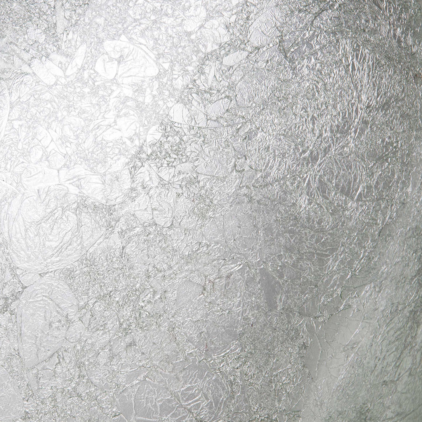 Silver foiled oval tempered glass vessel bathroom sink by Novatto, with a modern design and sleek oval shape.