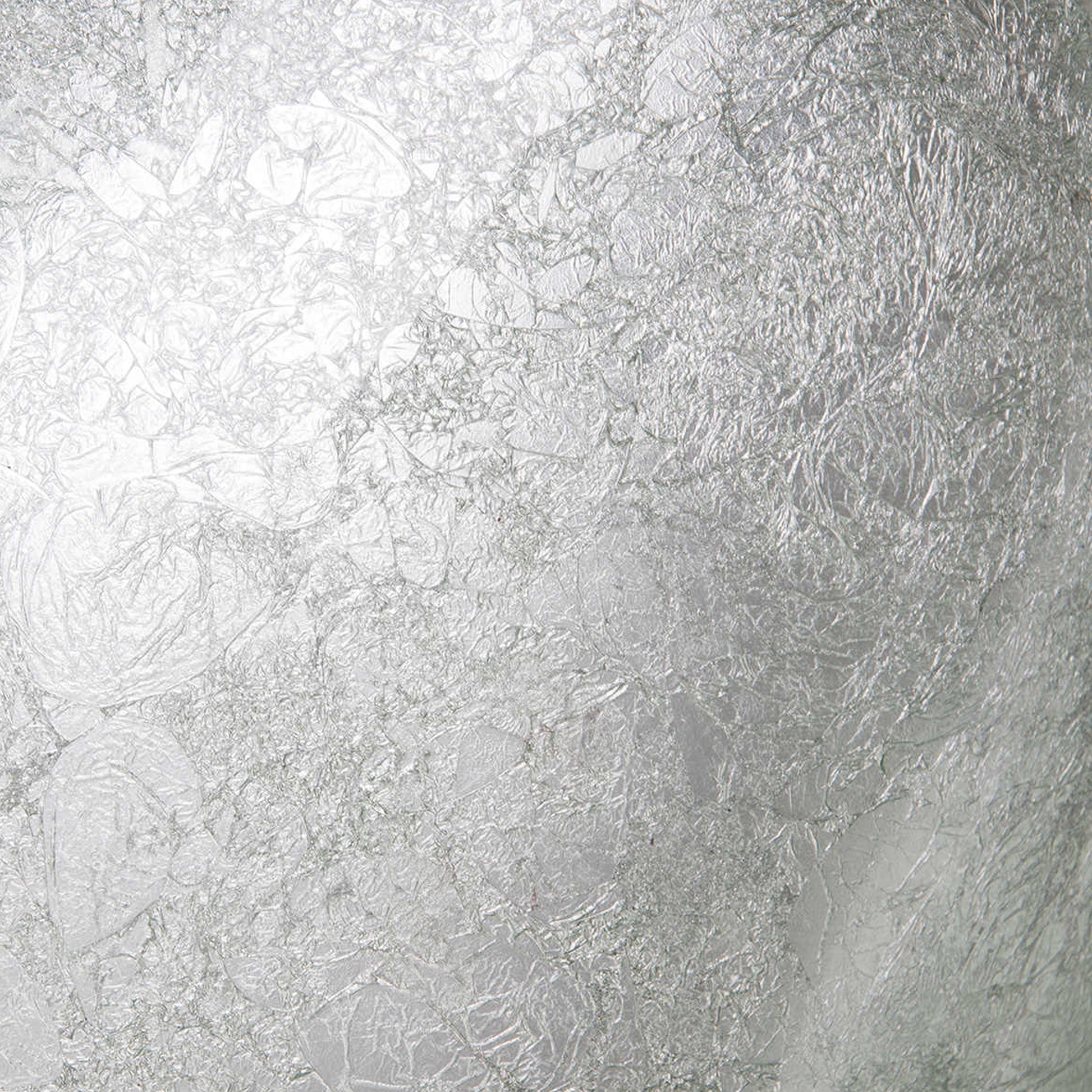 Silver foiled oval tempered glass vessel bathroom sink by Novatto, with a modern design and sleek oval shape.