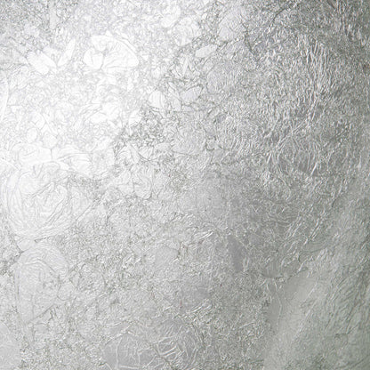 Silver foiled oval tempered glass vessel bathroom sink by Novatto, with a modern design and sleek oval shape.
