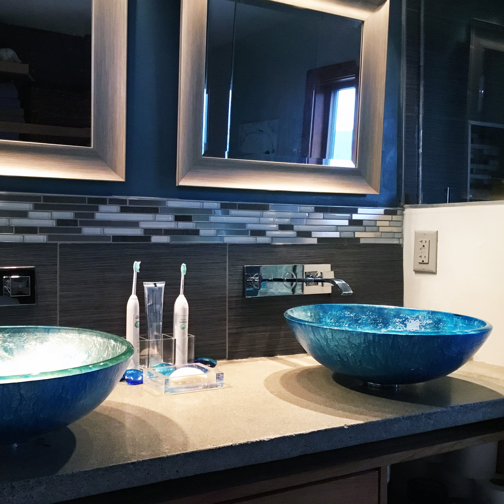 hand painted foiled blue glass vessel sink lifestyle