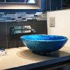 hand painted foiled blue glass vessel sink lifestyle