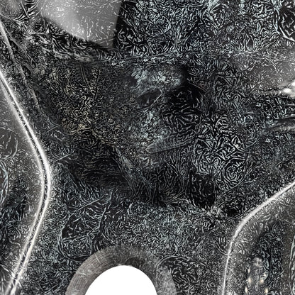 Modern black and silver hand foiled square tempered glass vessel bathroom sink by Novatto, shown in a close-up shot.