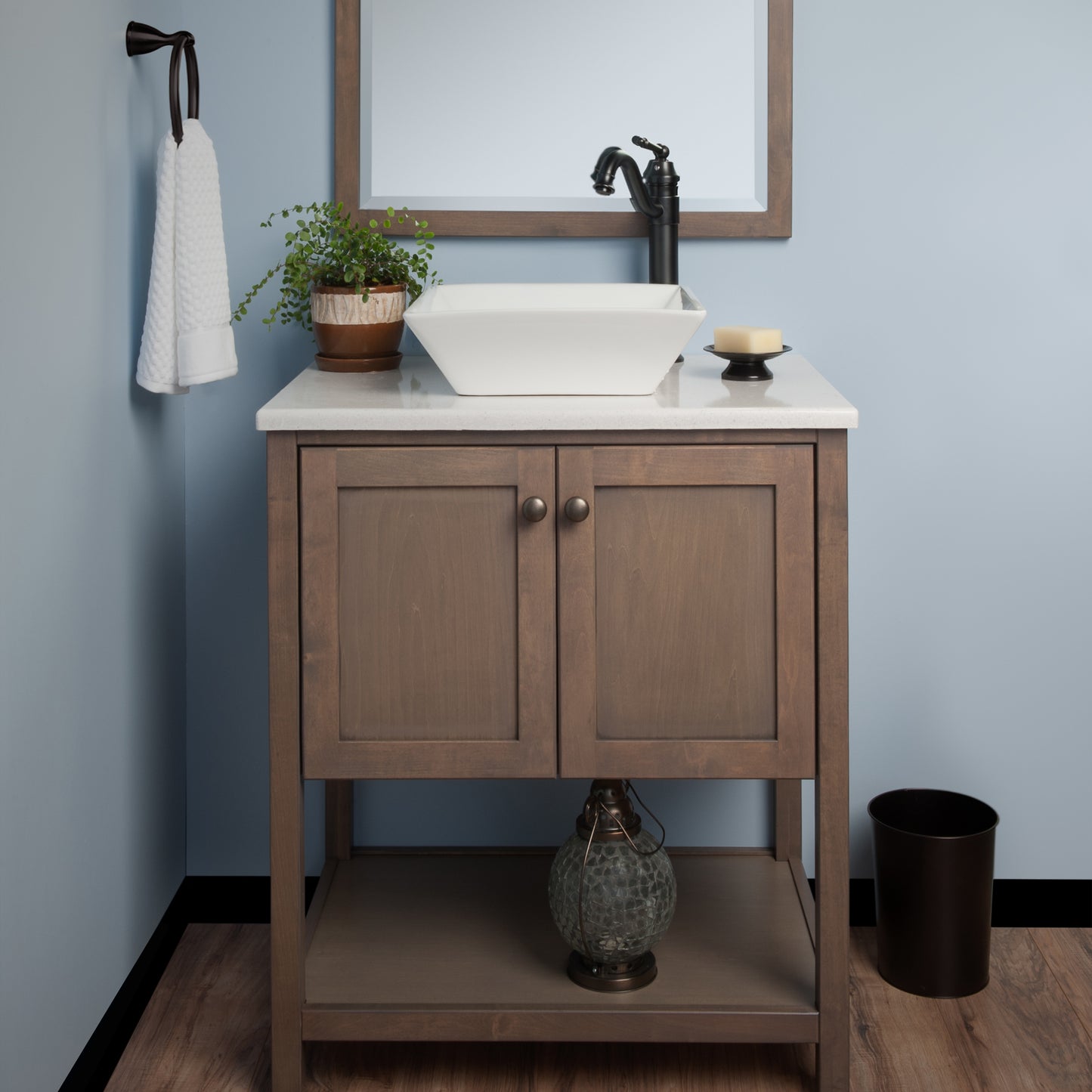 White porcelain square vessel bathroom sink by Novatto, traditional design with modern square shape, shown with faucet in lifestyle setting.